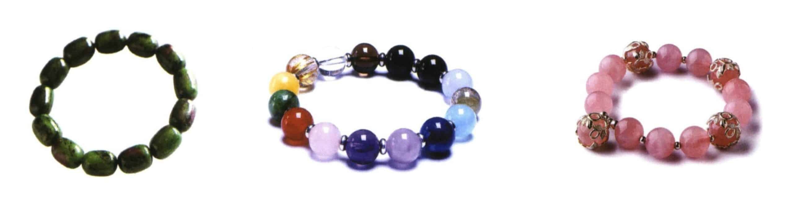 Bracelets and bangles are worn on the wrist and are commonly made from silver, gold, stones, crystals, leather, and wood. They have common designs, including strap styles and decorative styles.