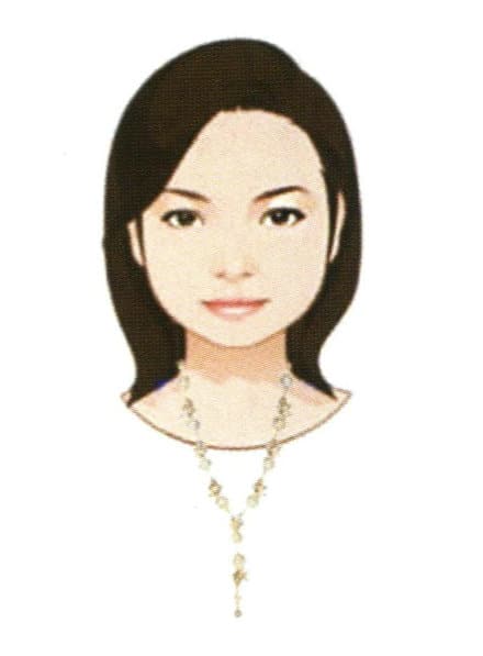 Round face wearing a "V"-shaped necklace