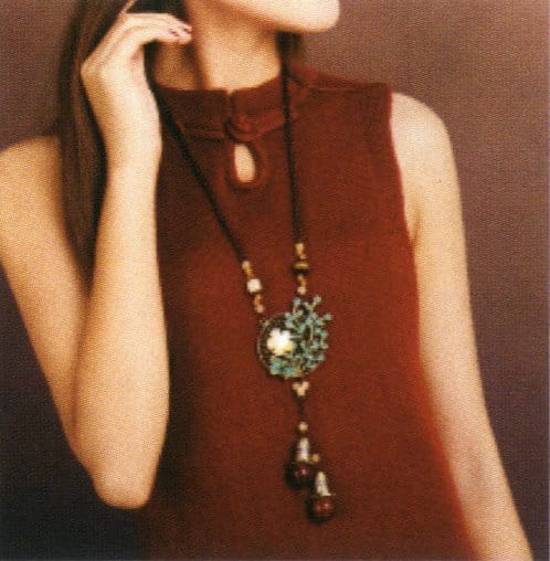 Turquoise pendant paired with ethnic-style clothing