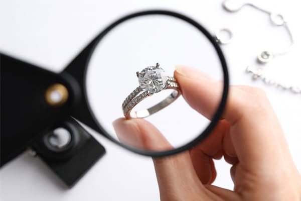 engagement rings strict quality conrol by magnify lens 600x400