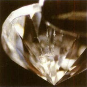 Figure 3–6 Laser drilling of a diamond