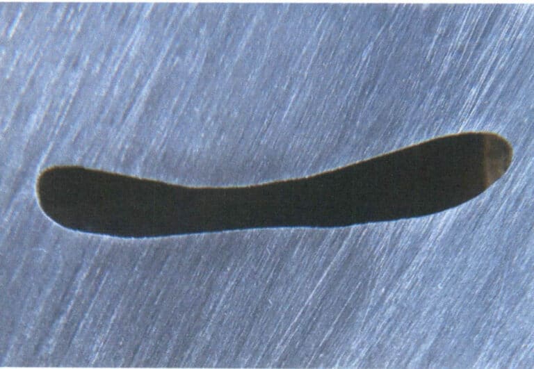 Figure 7–9 Long, narrow holes are not suitable for firing plique-à-jour enamel