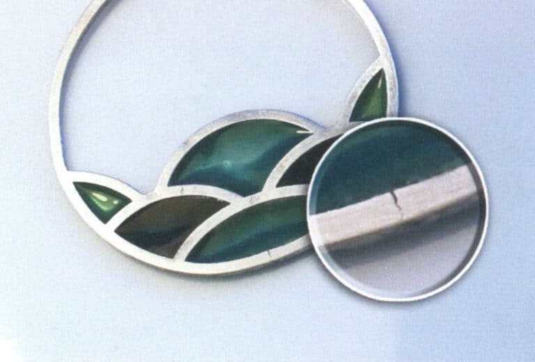 Figure 7–11 Cracks appearing in the metal frame