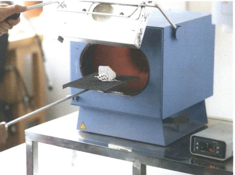 Figure 7-20 Positioning for firing openwork enamel using the vertical firing method