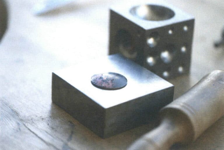 Figure 8-2 Copper base plate processed into a domed shape after annealing