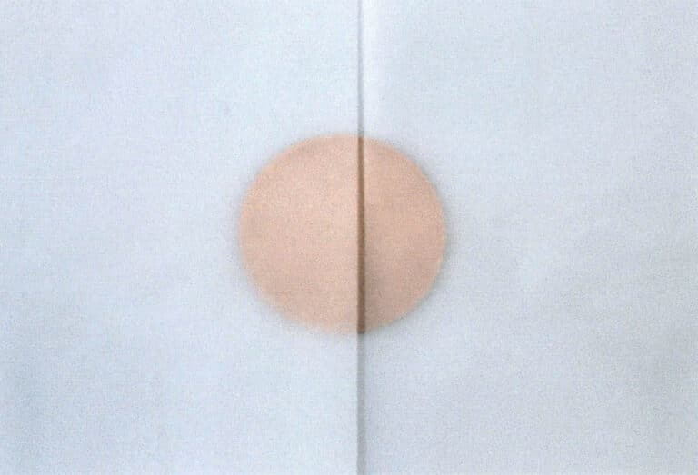 Figure 9–9 The sides are blocked with cardboard before sifting and sprinkling enamel