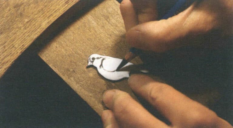 Figure 9–35 Drawing the design with an 8B pencil