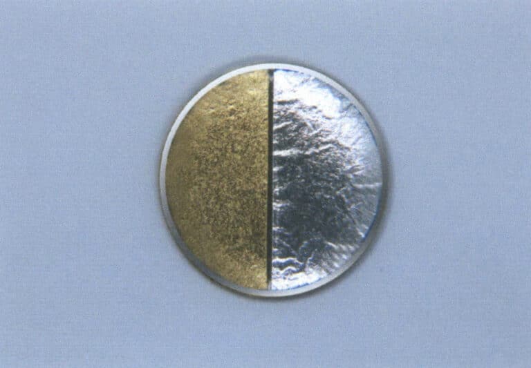 Figure 9–47 Effect of applying gold leaf and silver leaf on a red copper base