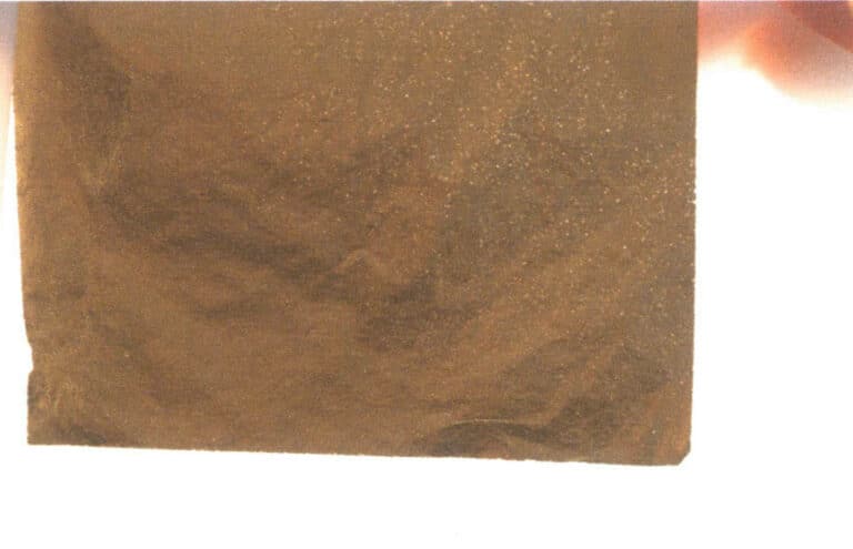 Figure 9-57 The treated gold leaf covered with fine holes