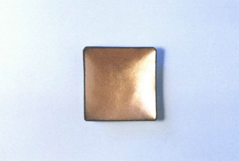 Figure 1–20 Colourless transparent underglaze fired on a red copper substrate