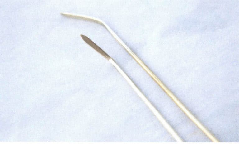 Figure 2–39 Two homemade brass glaze spatulas