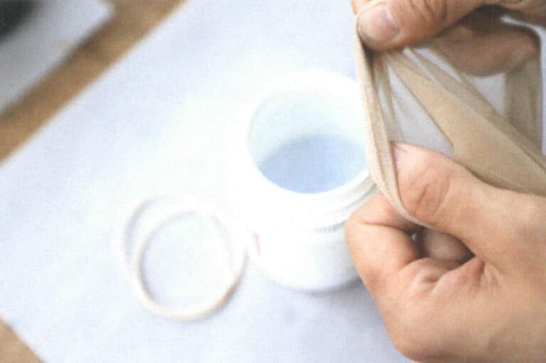 Figure 2–43 Homemade sieve using pantyhose