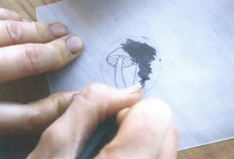 Figure 4–36 Shading the back of the tracing paper with an 8B pencil over the areas that have lines on the front