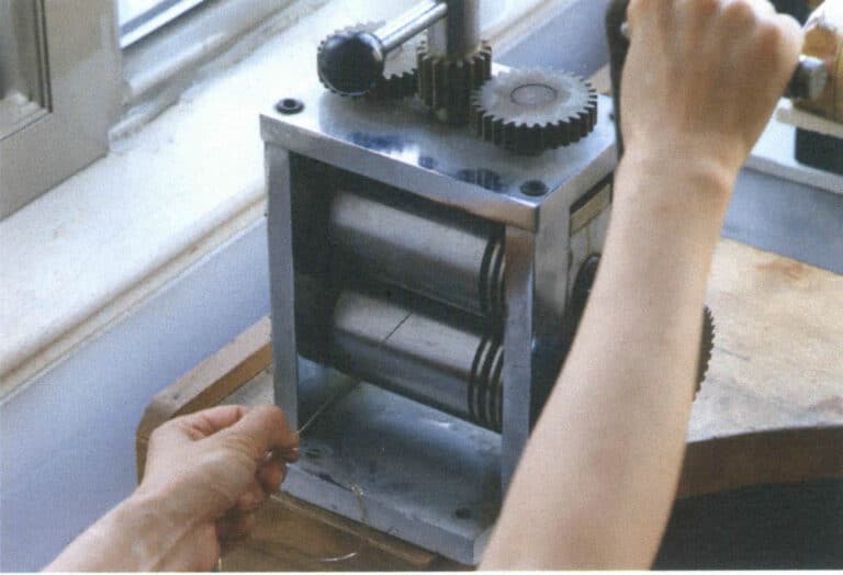 Figure 5-10 Preparing silver wire with rolling mill