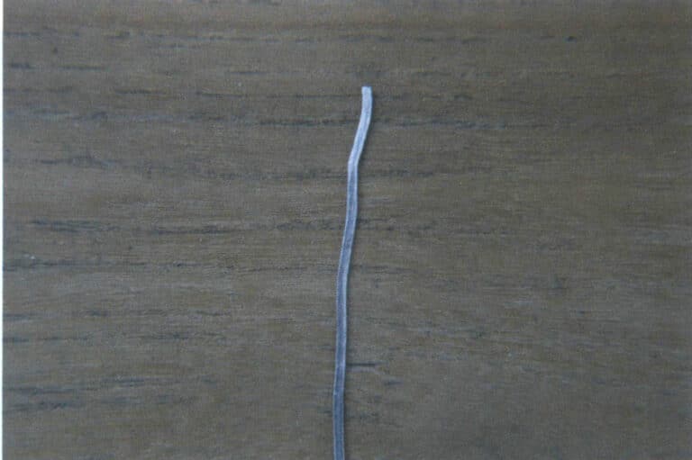 Figure 5–12 Wire deformed during pressing