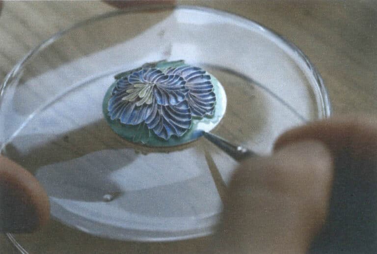 Figure 5–29 Applying the first layer of glaze